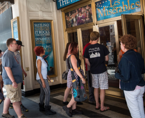 Theatre-goers in shorts